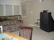 The living room with the big-screen TV